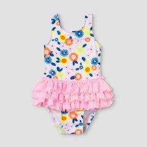 One piece with a tutu skirt and a bow back!